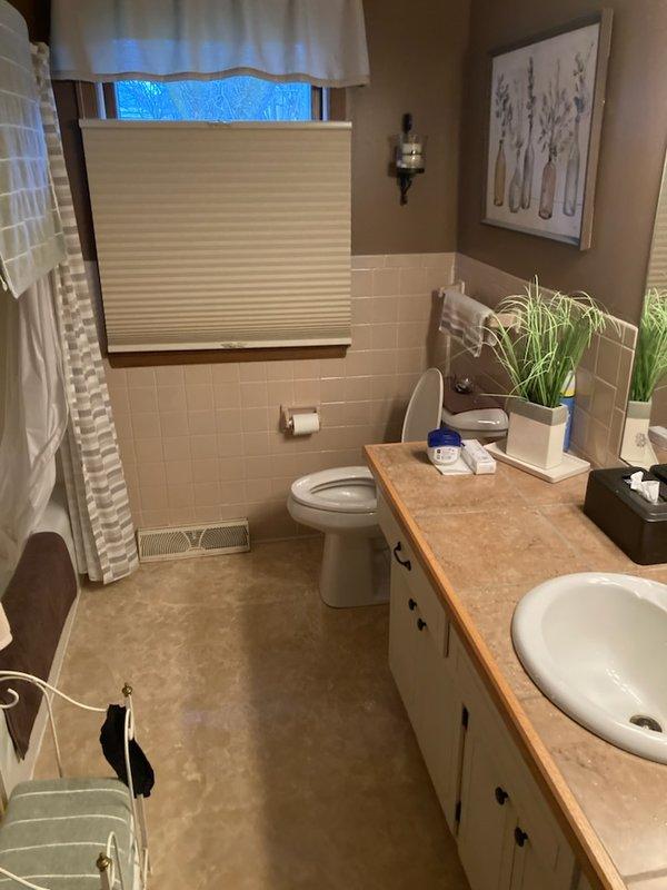 Responded to service call regarding toilet leaking at base. Upon inspection, found crack in toilet base around rim causing the leak. Removed damaged toilet and installed new ADA-compliant tall elongated toilet with proper wax seal and bolts. Tested for proper flushing operation and confirmed no leaks at base after installation.