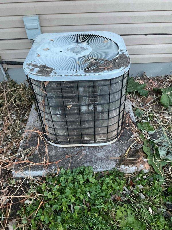 Performed scheduled furnace tune-up and diagnostic inspection. Identified inoperative inducer motor as source of no-heat condition, confirmed by voltage testing showing 120V reaching the component and thermal imaging revealing excessive heat (123.6°F). Exterior condensing unit exhibits significant dirt accumulation and vegetation encroachment. Customer opted to schedule consultation with advisor regarding repair versus replacement options.