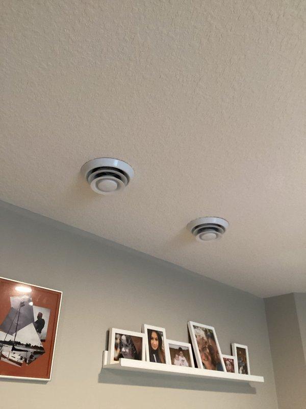 Diagnosed temperature imbalance between first and second levels of home built on concrete slab with non-traditional ductwork configuration. Adjusted supply vents—closing upper floor vents (floor registers with flex ducting) and opening lower level vents (ceiling registers)—to redirect airflow and balance temperatures. Recommended continuous fan operation and reduced air exchanger setting to improve circulation and create natural heat rise through the structure.