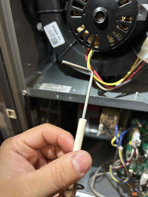 Performed comprehensive furnace tune-up on 5-year-old natural gas system. Addressed operational issues by cleaning dirty flame sensor, removing spiderweb buildup, clearing unwanted water accumulation from inducer housing, and bypassing control board to restore heating function. Completed system cleaning and replaced air filter to ensure optimal performance.