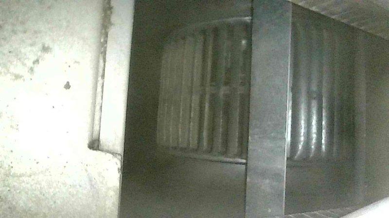 Responded to no heat complaint for 25+ year old furnace that was cycling without ignition. Bypassed furnace control board temporarily to restore heating function. Upon removing bypass clippers, unit continued to operate normally. Performed comprehensive diagnostics including gas pressure verification, carbon monoxide testing, and heat exchanger inspection with no hazardous conditions found. Cleaned flame sensor and checked pressure switch and flame rollout switches. Discovered extremely dirty furnace filter clogged with pet fur and dirt causing airflow restriction. Educated homeowner on proper filter maintenance, condensation trap cleaning, and keeping furnace area clear of obstructions. Unit now functioning properly.