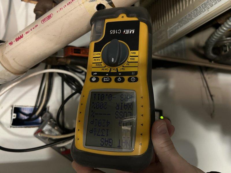 Responded to no heat call for 30+ year old electric furnace. Diagnosed faulty inducer motor producing grinding noise. Conducted electrical measurements with multimeter to verify component failure. Due to age of unit and part availability, recommended replacement. Customer opted for full system evaluation, with sales appointment scheduled.