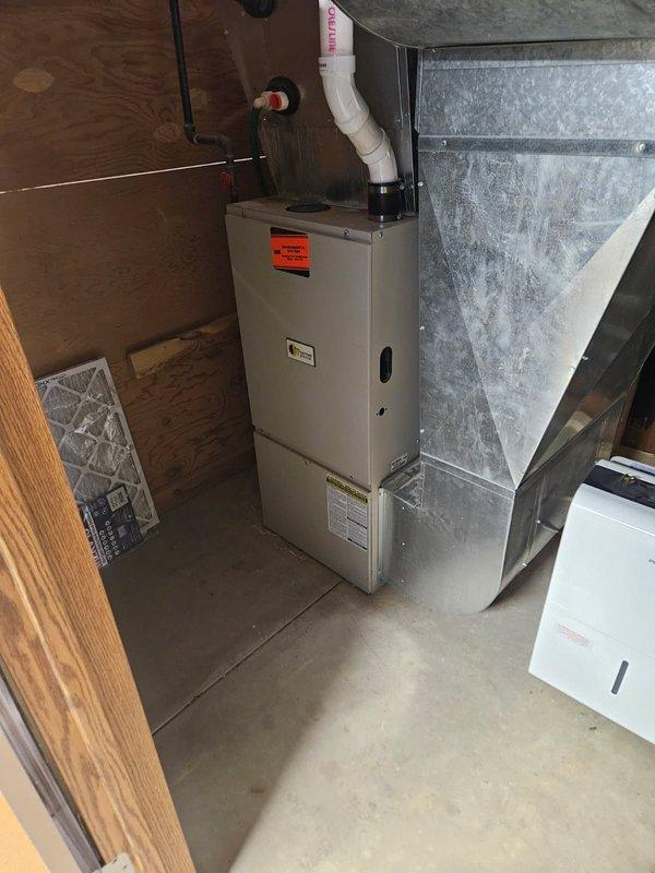 Responded to no heat service call for 20-year-old furnace system. Diagnostic inspection revealed extensive corrosion on internal components and motor control board, with visible rust damage on the blower assembly preventing proper fan operation. System is in severely deteriorated condition and requires significant repairs; customer was advised of options and scheduled for follow-up consultation tomorrow.