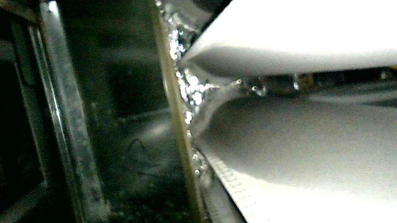 Performed comprehensive furnace tune-up on 10-year-old unit. Replaced dirty filter, cleaned flame sensor, and found heat exchanger with early-stage cracking at burner inlet. All electrical components tested within specifications, system operated normally with 45° temperature rise, and proper gas pressures were verified. Customer enrolled in filter replacement program after discussion about heat exchanger condition and recommendations.