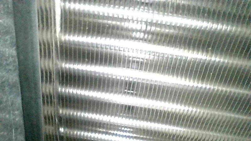 Performed comprehensive furnace tune-up on 10-year-old unit. Replaced dirty filter, cleaned flame sensor, and found heat exchanger with early-stage cracking at burner inlet. All electrical components tested within specifications, system operated normally with 45° temperature rise, and proper gas pressures were verified. Customer enrolled in filter replacement program after discussion about heat exchanger condition and recommendations.