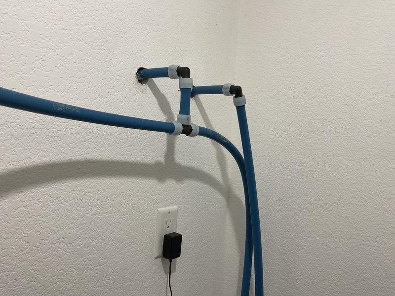 Responded to service call for water softener leak. Discovered leak at bypass valve on main floor softener unit. Removed the leaking water softener and looped the existing 3/4" PEX lines together to maintain system functionality. Note: property was originally a duplex with dual softener systems; second softener remains in place and operational.