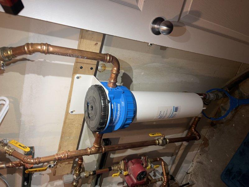 Inspected customer's water filtration system that was previously installed by our team. Determined customer needs replacement filter for existing unit. Documented current installation with photos and submitted formal request to Parts Department to source appropriate replacement water filter.