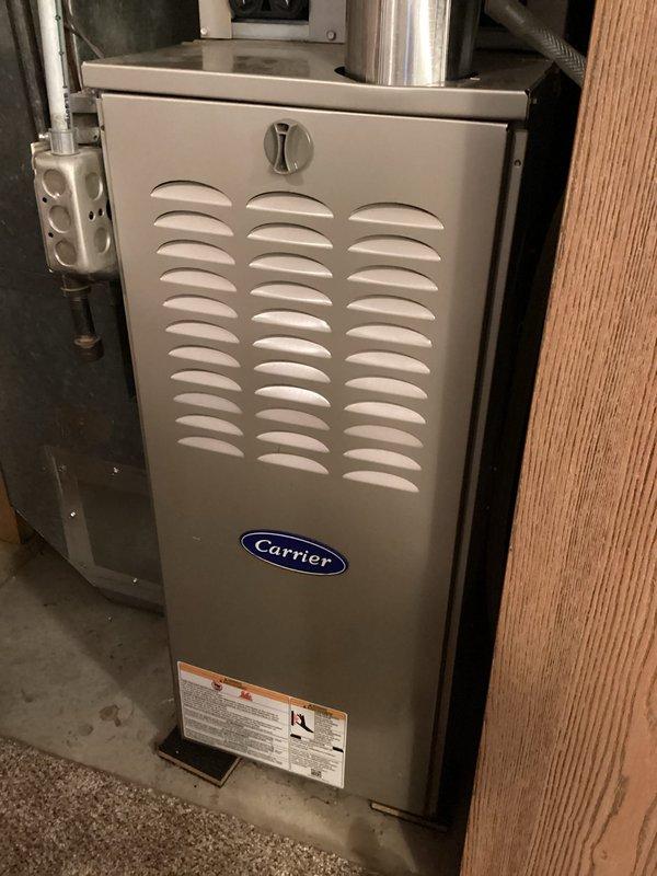 Resolved excessive noise coming from 5-year-old Carrier furnace blower wheel by addressing high static pressure in the ductwork. Removed blower assembly, modified ductwork to eliminate noise, and recommended installation of less restrictive air filter to improve system efficiency and prevent recurrence.