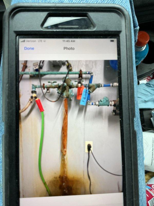 Responded to service call for leaking RPZ valve located in the chemical room. Upon inspection, found RPZ valve actively leaking with significant wall staining evident. Attempted to disassemble the valve for service but components could not be separated due to corrosion. Also identified a secondary issue with the atmospheric vent on the same line in another part of the room which was also leaking. Submitted comprehensive estimate for necessary repairs to both affected components.