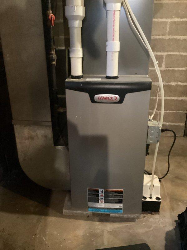 Performed comprehensive tune-up on 4-year-old Lennox furnace. Inspected and verified all components functioning within specifications. System successfully cycled through first and second stage operation with no issues detected.