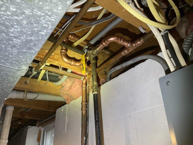 Replaced defective gate valve for front hose bibb and installed new ball valve, as the original was not closing properly. Also installed new ball valve for back hose bibb which previously had no shut-off valve. All installations were tested and verified to be functioning correctly.