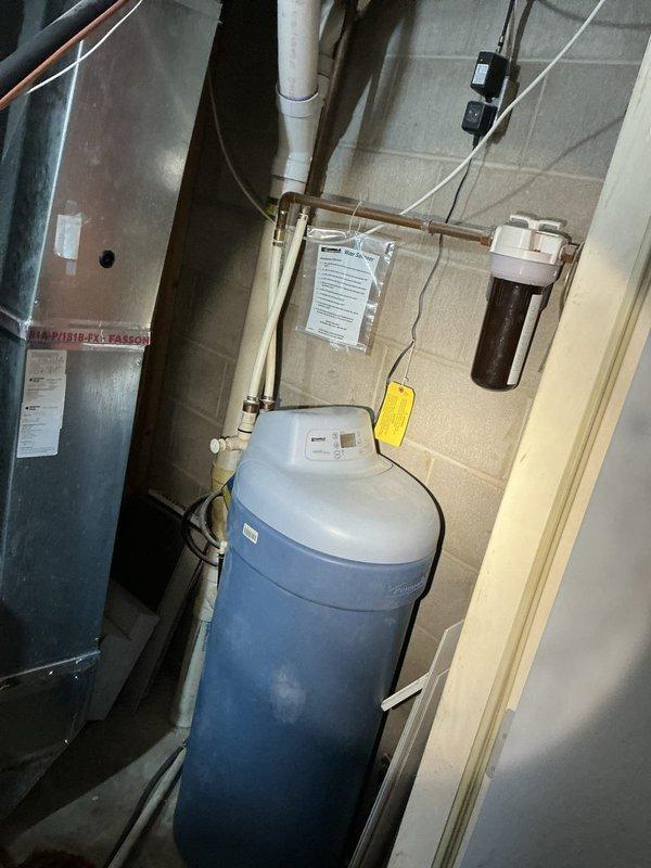 Replaced leaking water shut-off valve in the basement utility area that services the water treatment system. Installed new shut-off valve to properly control water flow to the filtration equipment. System now functioning properly with no leaks observed.
