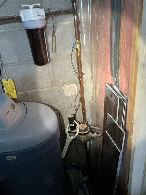 Replaced leaking water shut-off valve in the basement utility area that services the water treatment system. Installed new shut-off valve to properly control water flow to the filtration equipment. System now functioning properly with no leaks observed.