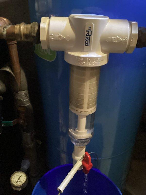 Replaced cracked PVC bushing on Rusco R500 sediment filter system which was actively leaking. Installed new filter assembly and re-piped connections to ensure proper operation and eliminate water leakage.