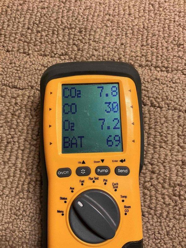 Performed annual furnace tune-up on relatively new (1-year-old) system. Conducted combustion analysis with readings showing O2 at 7.2-7.8% and CO at 32ppm, indicating acceptable combustion performance. Replaced flame sensor and installed new air cleaner to improve system efficiency and air quality. System verified operational with all components functioning properly.