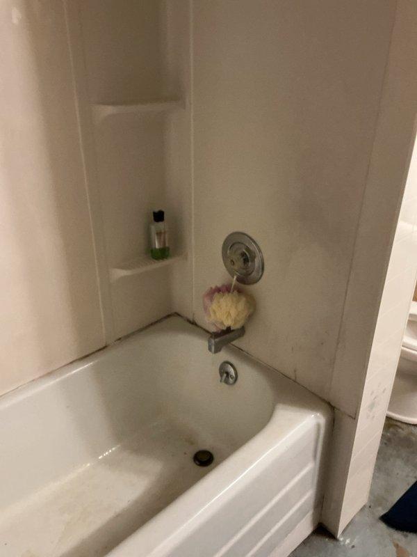 Responded to service call for a reported upstairs bathroom leak. Upon inspection, determined the toilet was the likely source of leakage. Removed toilet, replaced worn wax ring, and identified possible need for flange replacement. Documented additional plumbing issues with bathtub and sink areas showing signs of water damage and deterioration; left estimates for recommended repairs.