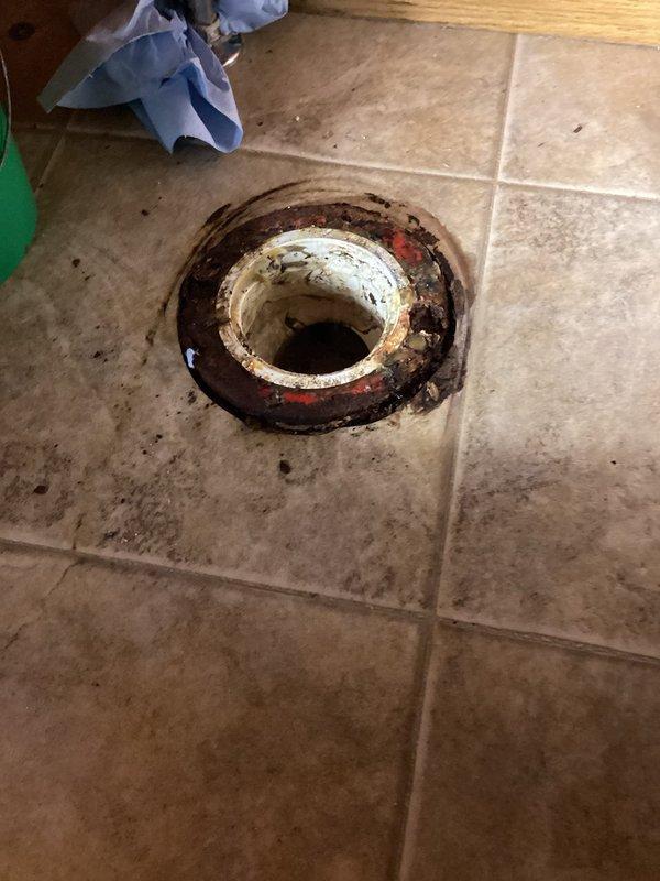 Completed installation of two comfort height ADA elongated toilets as requested - one upstairs and one downstairs. Observed significant deterioration of one toilet flange with extensive corrosion requiring replacement before new toilet installation.