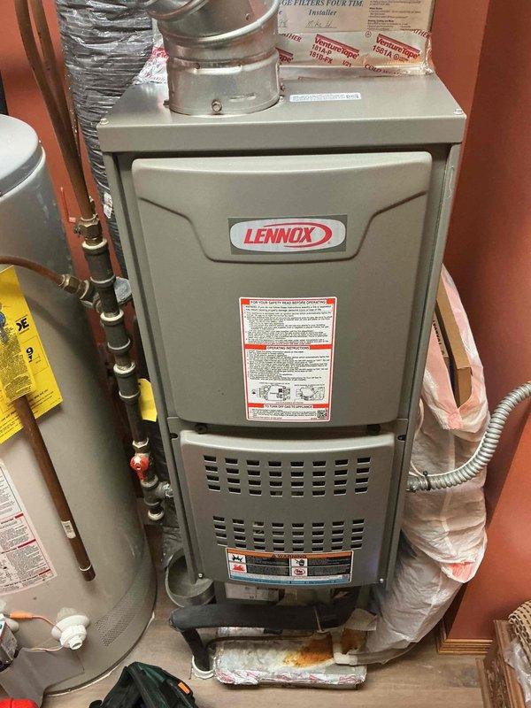 Performed annual tune-up on 4-year-old Lennox furnace. Inspected FASCO blower motor, electrical connections, and all operational components. Furnace is functioning properly with no current issues, though client noted past problems with ignitor. System left in full operational condition.