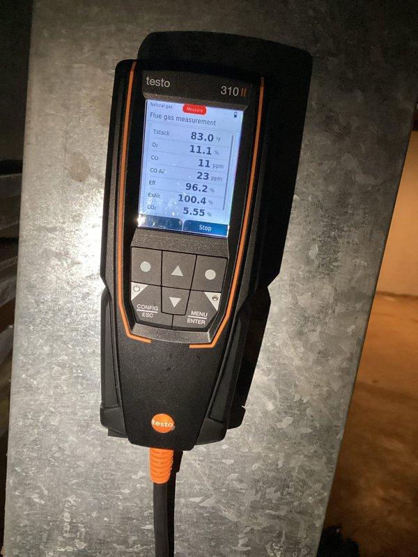 Performed furnace tune-up on approximately 8-year-old natural gas unit following customer report of gas odor from exhaust during startup. Comprehensive inspection confirmed unit is operating safely with no internal gas leaks. Verified proper function of ignitor and flame sensor, and confirmed gas pressure within acceptable range. Combustion analysis performed with Testo 310 analyzer showing excellent efficiency (96.2%) with safe CO levels (11 ppm).