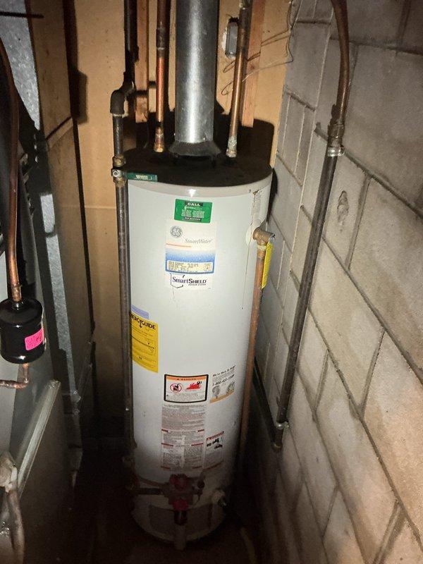 Successfully installed a 40-gallon natural gas standard vent water heater in place of an existing unit, complete with all required connections and venting. Additionally, replaced the frost free hose bibb with a ball valve, utilizing existing connections. All work was performed according to code with appropriate permit.