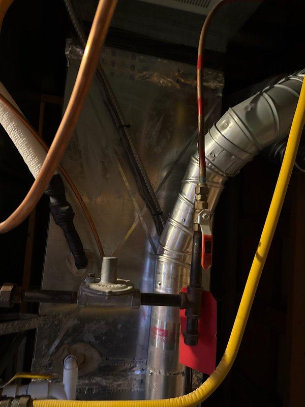 Performed standard furnace tune-up on 7-year-old system with pilot light failure. Identified igniter touching burner, built-up igniter and flame sensor, and high-rated air filter causing no heat condition. Corrected issues by adjusting igniter position, cleaning sensor and igniter components, and removing restrictive air filter to restore proper operation.