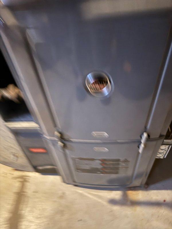 Performed standard furnace tune-up on 7-year-old system with pilot light failure. Identified igniter touching burner, built-up igniter and flame sensor, and high-rated air filter causing no heat condition. Corrected issues by adjusting igniter position, cleaning sensor and igniter components, and removing restrictive air filter to restore proper operation.