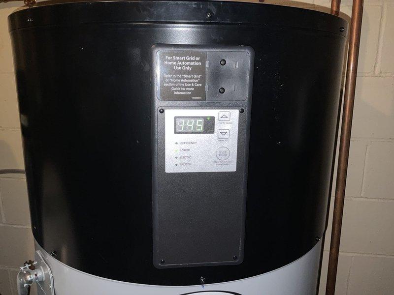 Responded to service call for hybrid water heater showing ECC error code (heat pump fault). Customer reported insufficient hot water for walk-in tub. Reset water heater and tested operation by running hot water until heater activated. Monitored system for 30 minutes, confirming normal operation with temperature reading of 149°. Provided customer with instructions to monitor for recurrence of error code or performance issues.