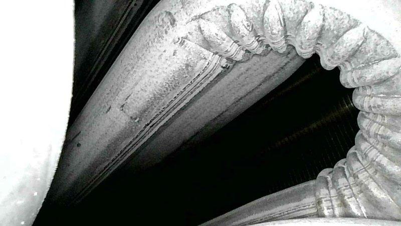 Responded to no heat complaint on 21-year-old Amana furnace. Diagnosed short flame cycle issue caused by dirty flame sensor, which was thoroughly cleaned resulting in proper ignition and sustained operation. Performed comprehensive system inspection revealing potential failure points including corroded inducer motor seal, leaking collector box seal, and beginning collector box leakage. Recommended replacement of inducer motor and collector box to prevent future system failure.