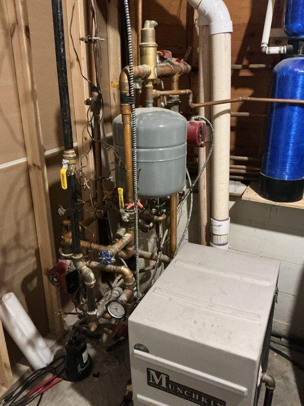 Successfully replaced the failed transformer for zone valves on the customer's boiler system, restoring proper heating functionality. Noted issues with draining the boiler system as no water came out when drain valve was opened, likely due to connection with side arm tank and open fill valves. System is now operating correctly after transformer replacement.