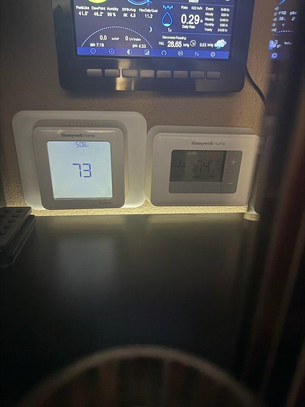 Responded to wood boiler system operating issue with zones not shutting off at temperature. Diagnosed wood stove lockout and reset unit to restore operation. Examined pump functionality throughout system and replaced garage pump as troubleshooting measure. Identified design issue causing continuous flow through hot water coil loop even when pump is inactive. Recommended installation of relay-in-a-box (RIB) to allow proper thermostat control of blower and pump to eliminate persistent heat problem.