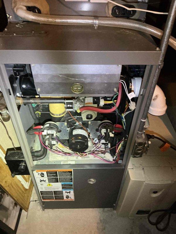 Performed diagnostic evaluation on 14-year-old Lennox furnace with reported no heat condition. Inspection revealed significant rust and corrosion throughout the heat exchanger with visible streaking patterns indicating moisture damage. Determined furnace has failed heat exchanger, making unit unsafe for continued operation due to potential carbon monoxide hazards. Advised customer of findings and recommended replacement rather than repair due to age of equipment and severity of damage. Customer informed that annual flame sensor cleaning was addressing symptoms rather than resolving underlying systemic failure.