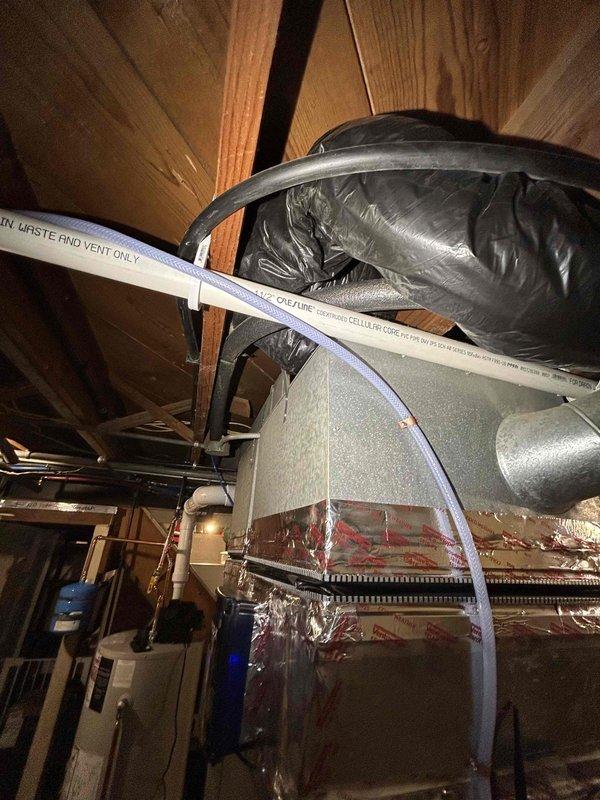 Responded to service call for malfunctioning condensate pump that was leaking and failing to properly evacuate water. Diagnosed issue as missing clamp on hoses causing air pressure loss, which prevented proper water extraction. Installed appropriate clamp and sealed connections, successfully eliminating the leak and restoring proper condensate flow.