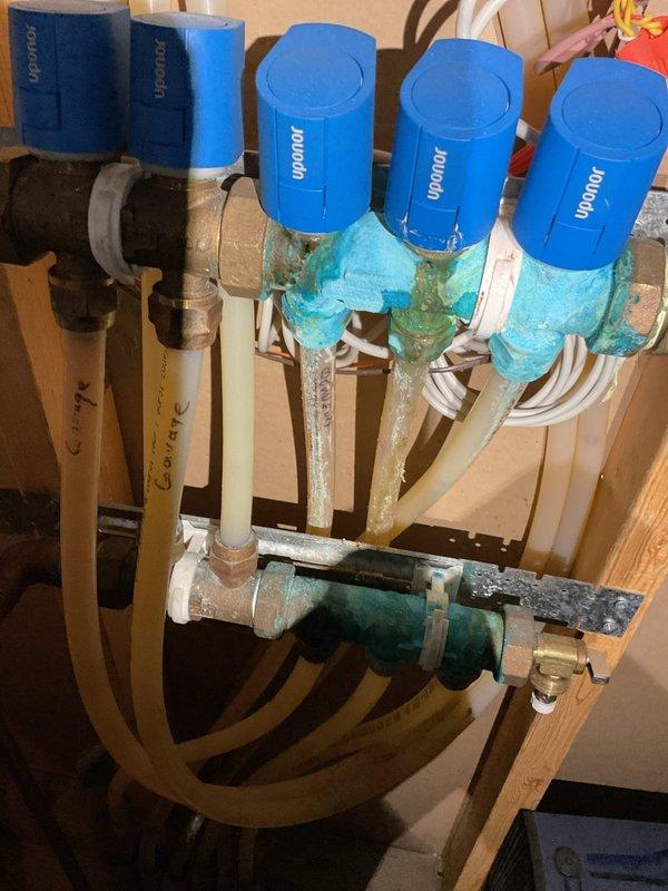 Responded to no heat call for a 23-year-old furnace. Diagnosed system throwing error codes due to faulty hot surface igniter, which was not glowing despite power reaching it (confirmed at 0 ohms). Observed proper operation of inducer motor and pressure switch. Also identified significant corrosion on the manifold for the in-floor radiant heat system, with visible blue-green oxidation on multiple copper fittings. After discussing options, homeowner declined repairs as system was previously identified as nearing end of life during October service visit.