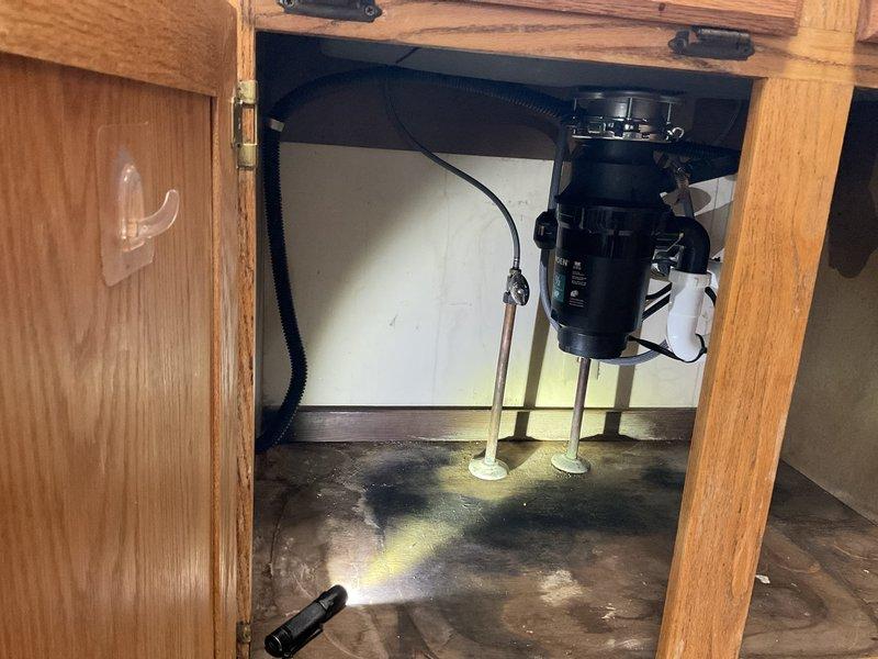 Successfully installed customer-supplied kitchen sink and faucet along with company-provided garbage disposal. Completed all necessary plumbing connections using PVC piping and drain trap assembly, ensuring proper functionality with no leaks.