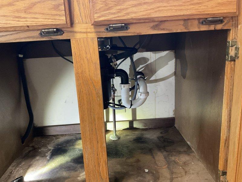 Successfully installed customer-supplied kitchen sink and faucet along with company-provided garbage disposal. Completed all necessary plumbing connections using PVC piping and drain trap assembly, ensuring proper functionality with no leaks.