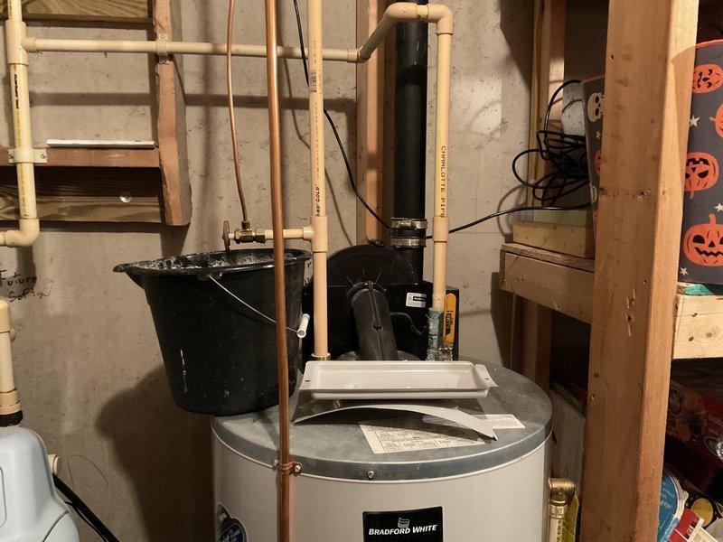 Replaced non-functional 2004 Bradford power vent water heater due to seized blower motor that was causing no hot water. Installed new 50-gallon LP power vented water heater with proper venting through exterior wall, restoring hot water service to the residence.