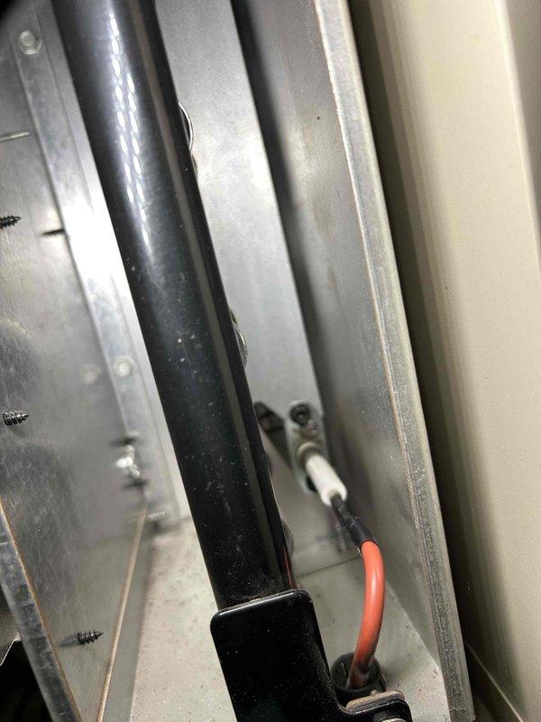 Responded to service call for a garage Big Maxx heater displaying a 2-blink error code. Diagnosed ignition failure despite normal startup sequence and gas call. Inspected control board and high voltage lead finding no cracks or damage. Performed maintenance including pressure switch clearing and flame sensor cleaning. Verified proper gas pressure. Determined spark igniter was faulty - would spark when unplugged but failed to function when properly connected. Resolved issue by replacing igniter.