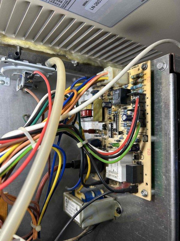 Responded to service call for a garage Big Maxx heater displaying a 2-blink error code. Diagnosed ignition failure despite normal startup sequence and gas call. Inspected control board and high voltage lead finding no cracks or damage. Performed maintenance including pressure switch clearing and flame sensor cleaning. Verified proper gas pressure. Determined spark igniter was faulty - would spark when unplugged but failed to function when properly connected. Resolved issue by replacing igniter.