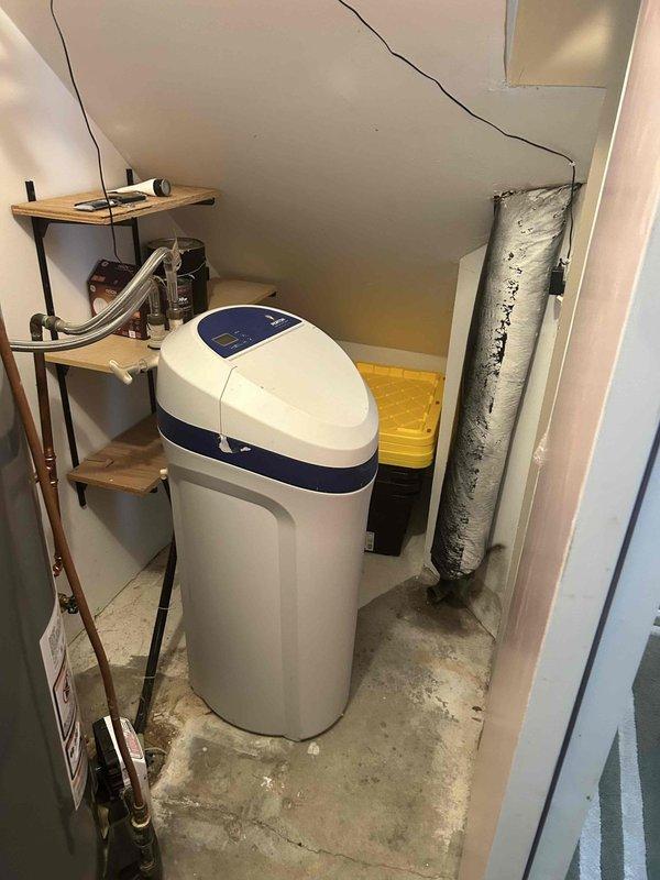 Performed comprehensive furnace tune-up on 30-year-old RPI II system with intermittent operation issues. Adjusted gas train pressure from 3.94 inWC to 3.34 inWC and cleared accumulated debris from condensate drain line and trap. Verified proper function of inducer motor, capacitor, pressure switch, control board connections, and thermostat operation with combustion CO recorded at 2 ppm. Noted moderate condition of return air filter; system now operating normally.