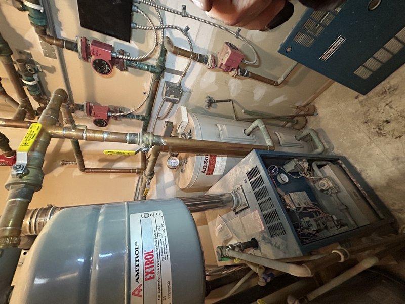 Performed standard boiler tune-up and identified non-functioning bedroom zone pump requiring replacement. Replaced pressure switch during service call. System inspection revealed absence of isolation valves on pump, necessitating full system drain for future pump replacement. Replacement pump pricing and follow-up service to be scheduled.