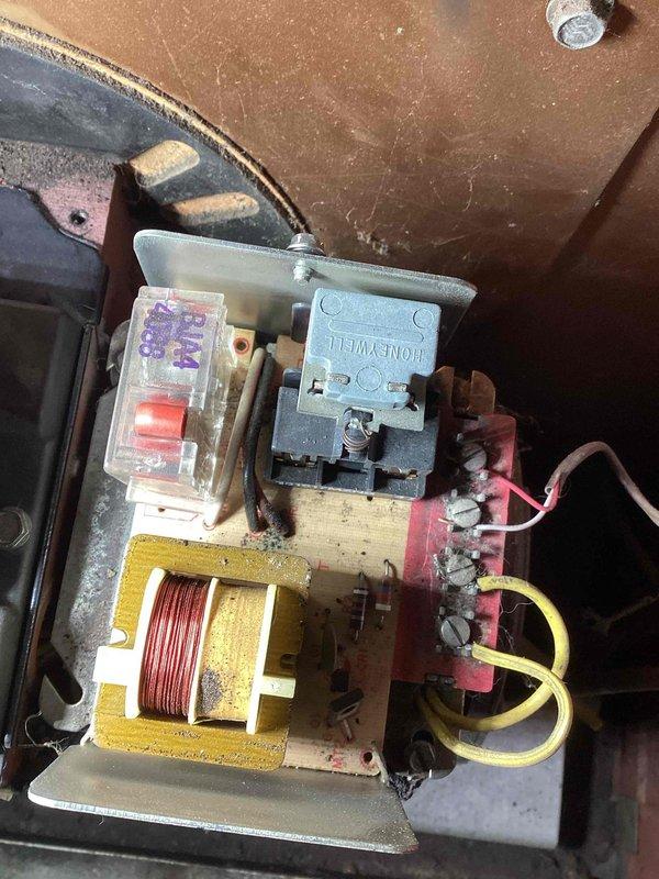 Responded to service call for non-heating ThermoElite oil furnace (30+ years old). Diagnostics revealed system failure due to a clogged nozzle preventing proper fuel combustion. Replaced nozzle, bled fuel line, and reset ignition module, which restored normal heating operation. Recommended replacement of aging module for continued reliable performance.