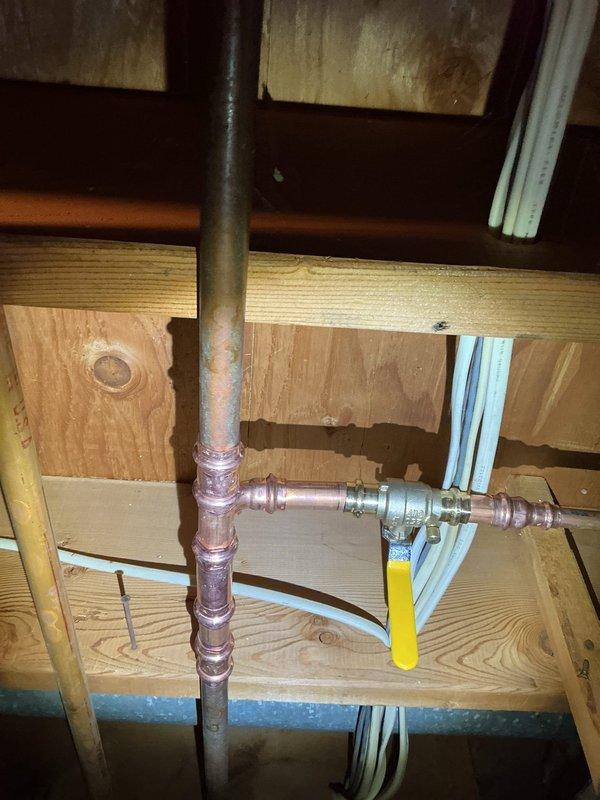 Responded to a service call for water leakage in a previously serviced area. Upon inspection of the copper pipe system in the basement/crawlspace, determined the press ball valve had not been fully pressed during prior installation. Corrected the issue by properly pressing the fitting to establish a secure connection, which resolved the leak.