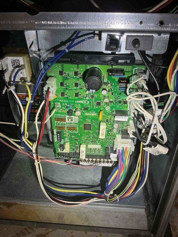 Inspected customer's secondary Lennox furnace following previous recommendation from technician Ben. Observed rust and water damage in the upper cabinet area, likely from previous AC condensate leak. Performed pressure switch testing and connected drain hose to proper termination point to prevent future moisture issues. Unit is approximately 7-8 years old and currently operational despite visible corrosion.