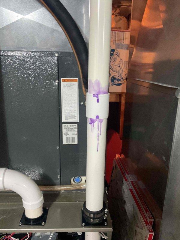 Completed exhaust system repairs on residential furnace involving replacement of 2-inch PVC venting components. Installed new exhaust mounting bracket flange at furnace connection point and reconstructed PVC exhaust piping with proper connections. Total repair time: 2 hours.