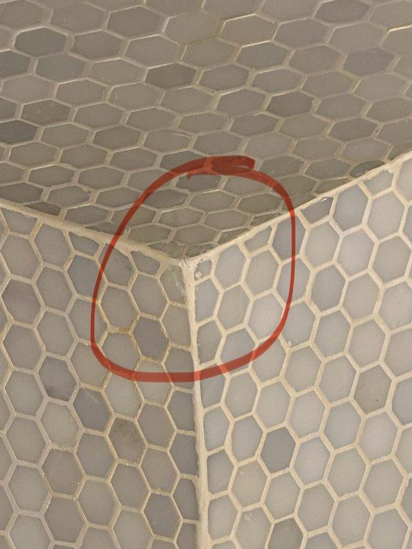 Responded to leak report from ceiling above basement shower. Diagnosed issue as a pin hole leak in the 1/2" copper water supply line for the main floor toilet. Replaced damaged copper tubing with new 1/2" PEX tubing, installed appropriate fittings and new stop valve. Work was completed with access through entry closet, resolving the water intrusion problem.