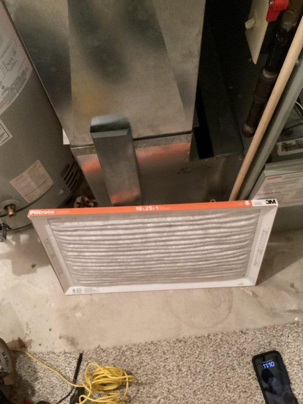 Diagnosed and serviced a Trane XE 90 furnace (20+ years old) that was blowing cold air with a flashing code. Found a loose electrical harness which was secured to restore heat function temporarily. Identified crack in heat exchanger requiring replacement. Customer scheduled for complete furnace and AC replacement quote as the AC unit had also failed in fall.