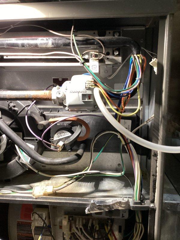 Diagnosed furnace failure due to inoperative Honeywell gas valve that was receiving proper voltage but failing to open. Visual inspection revealed evidence of moisture damage within the system. Inspected control board and wiring connections for integrity. Recommended replacement of the gas valve to restore heating functionality.