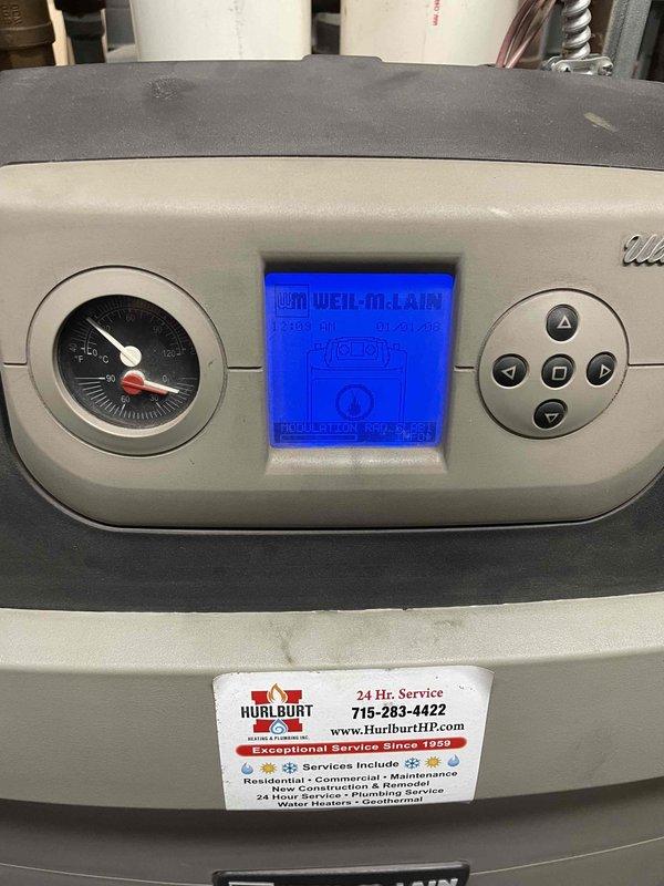 Performed comprehensive maintenance on dual boiler system that was heavily fouled. Thoroughly cleaned severely plugged heat exchangers requiring multiple flush cycles and mechanical clearing. Replaced gaskets and ignitors, cleaned condensate traps, and verified proper system operation. Both Weil-McLain boilers now modulating correctly after service.