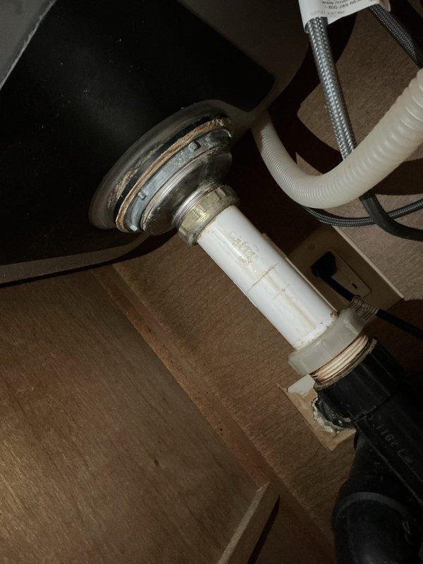 Responded to service call for leaking sink with worsening condition after customer attempted repair. Inspection revealed broken basket strainer causing leak at sink drain connection. Removed damaged component and installed new basket strainer to restore proper seal and eliminate under-sink water leakage.