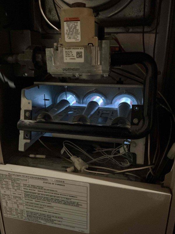 Diagnosed intermittent operation on 24-year-old Lennox gas furnace. Found weak flame sensor causing system shutdowns and identified early-stage heat exchanger deterioration with separating rings. Replaced flame sensor to restore proper operation and scheduled follow-up service advisor appointment to address heat exchanger concerns.